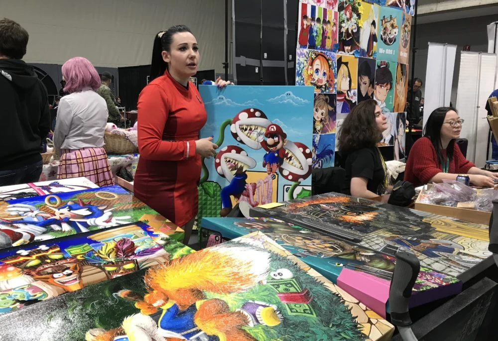 Cette membre de la Fédération des Planètes Unis arrondit ses fins de mois avec son art